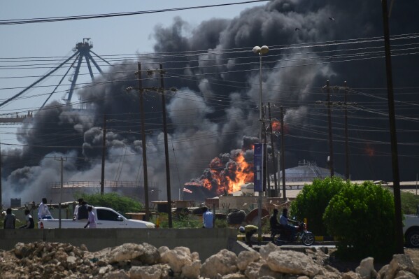 Smoke billows after drone strikes by the paramilitary Rapid Support Forces (RSF) targeted the northern port in the Red Sea city of Port Sudan, Sudan, May 6, 2025. (AP Photo, File)