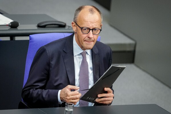 Federal Chancellor Friedrich Merz (CDU) attends a Bundestag session in Berlin, on Thursday, May 21, 2026. (Kay Nietfeld/dpa via AP)